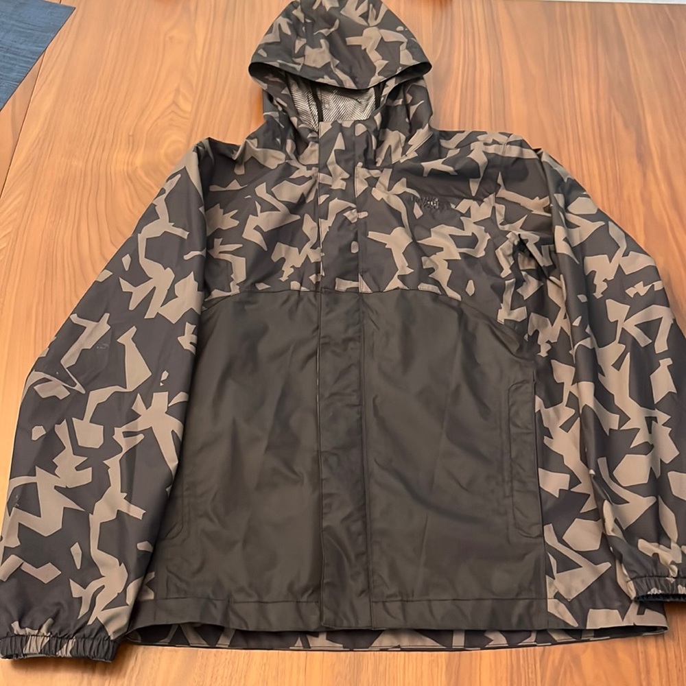 North Face rain coat kids size 14/16